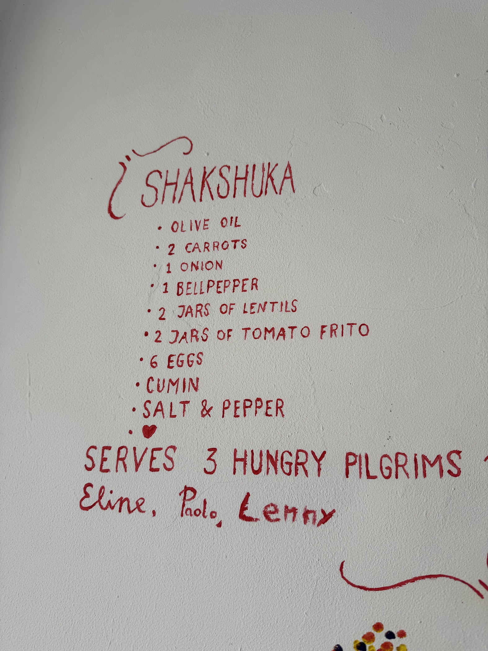 a shakshuka recipe painted onto the wall at Albergue La Casa Verde on the Camino de Santiago